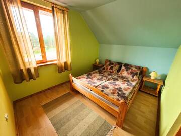 Фото номера Дом с 4 спальнями Гостевой дом Kunči г. Приекули 8